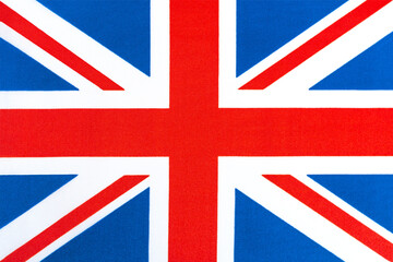 Fototapeta premium The national flag of Great Britain on a fabric basis in close-up