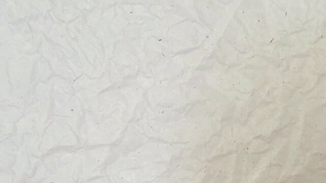 Real white paper texture moving background. plain white crumpled paper background