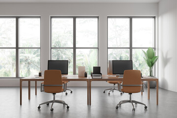 Modern office interior with two workstations and large windows. 3D Rendering