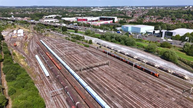 Commuter Train Driving Through a Siding Depot