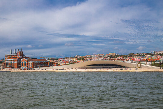 View with the Electricity Museum and Museum of Art, Architecture, and Technology on the banks of the Tagus river