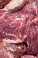 a sliced piece of pork meat from the neck