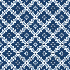Fototapeta premium Elegant geometric pattern in blue and white hues.