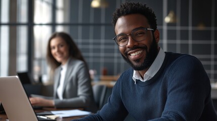 The smiling office colleagues