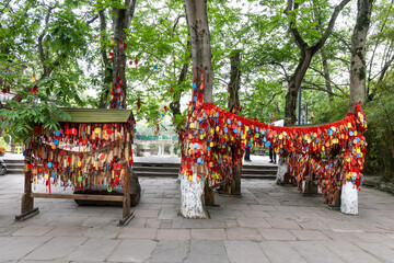 Popular bodhi wishing tree in Huanglongzi ancient town in Sichuan China with thousand of wishes...