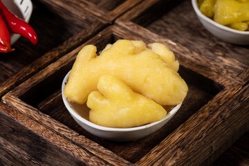 Hot and sour ginger is a traditional pickle in Asian countries. It has a sour and spicy taste. Food is pickled in jars.