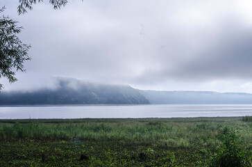 Landscape of Bakota River and mountains Ukraine Dniester River. Photo of the flooded village.   .   .