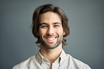 Happy young European professional business man looking at camera, headshot close up portrait....