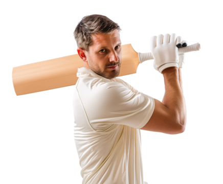 Caucasian cricket player pose with his cricket bat over shoulder