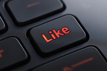 Close-up of a keyboard with a red Like key.