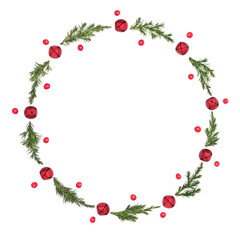 Christmas wreath with fir, red bell baubles and holly berries on white background. Minimal festive design for greeting card, logo, gift tag, invitation. Copy space.