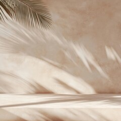 A wall with a palm tree leaf and a shadow on it. The wall is tan in color
