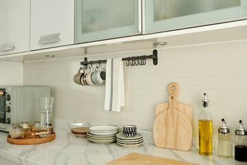 Modern kitchen table with clean crockery