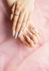 Female Hands with beautiful pearl manicure