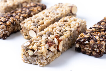 Healthy Muesli bar with nuts and seeds isolated on white background