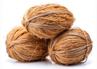 Bundle of natural coconut fibers isolated on a white background, showcasing the versatility and eco-friendly properties of this sustainable material.