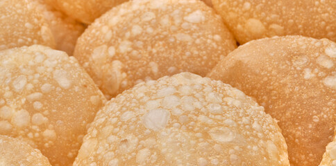 Texture of round boortsogs as culinary background. Traditional dish of Siberian Tatars