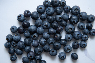 Delicious blueberries on a white background