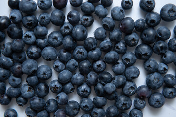Delicious blueberries on a white background