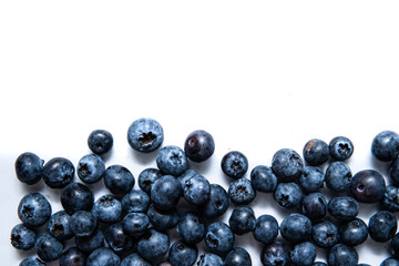 Delicious blueberries on a white background