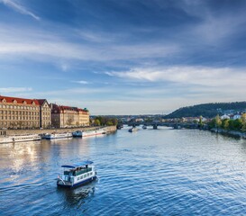 Naklejka premium Tourist boats on Vltava river in Prague