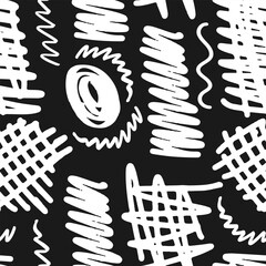 Seamless pattern with randomly placed white scribbles on a black background. Vector illustration