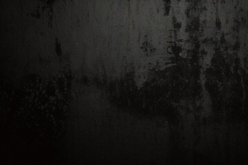 Obraz premium Black wall rough texture background, concrete floor or old grunge backdrop, illuminated by sun ray. Close up of dark graphite surface for modern background design. Concept of textures and background.