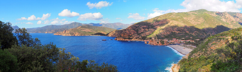 View of the Gulf of Porto in Corsica (Isle of Beauty), topped by a Genoese tower, is one of the gateways to the Scandola reserve and the Piana coves, both listed as UNESCO World Heritage Sites