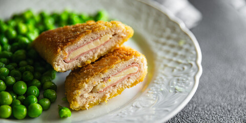 cutlet cordon bleu chicken meat, cheese, bacon meal snack on the table copy space food background rustic top view