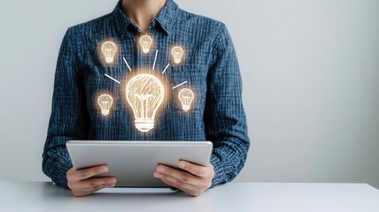 Entrepreneur using a tablet to access online resources for small business funding and startup grants, focusing on financial support for startups