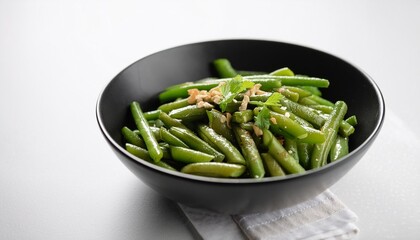 stir fried garlic ginger green beans in black bowl