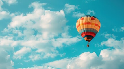 Fototapeta premium Hot Air Balloon Soaring Through The Sky