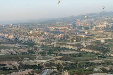 Take a hot air balloon ride to see the strange rock formations of Cappadocia, Turkiye