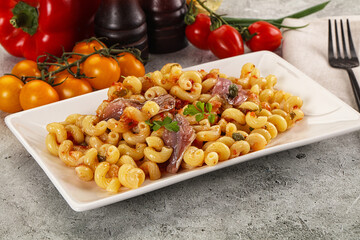 Italian pasta cellentani with anchovy