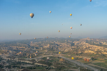 Take a hot air balloon ride to see the strange rock formations of Cappadocia, Turkiye