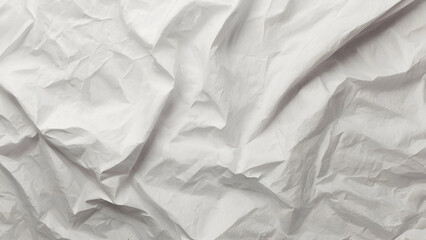 Crumpled white paper with texture in soft light, captured indoors during the day