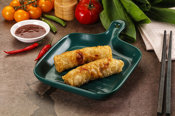 Vietnamese stuffed spring roll served sauce