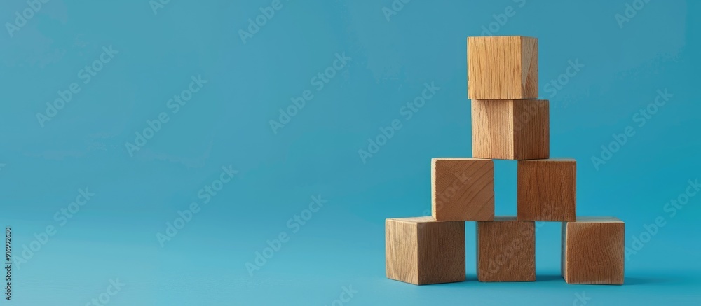 Poster a symbolic representation of a demo day message portrayed on wooden blocks against a blue background