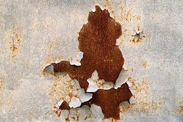 Old rusty metal sheet texture. Abstract wall grunge background. Oxidation on iron plate.