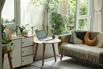 Modern design living room with sofa and panoramic big windows