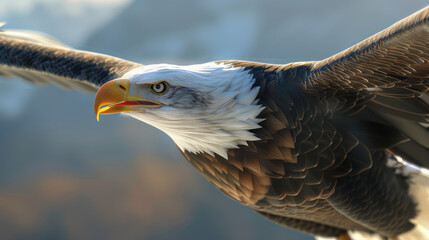 Obraz premium A close-up photograph of a bald eagle in flight, wings spread wide, beak slightly open, background of a mountainous landscape with a clear blue sky