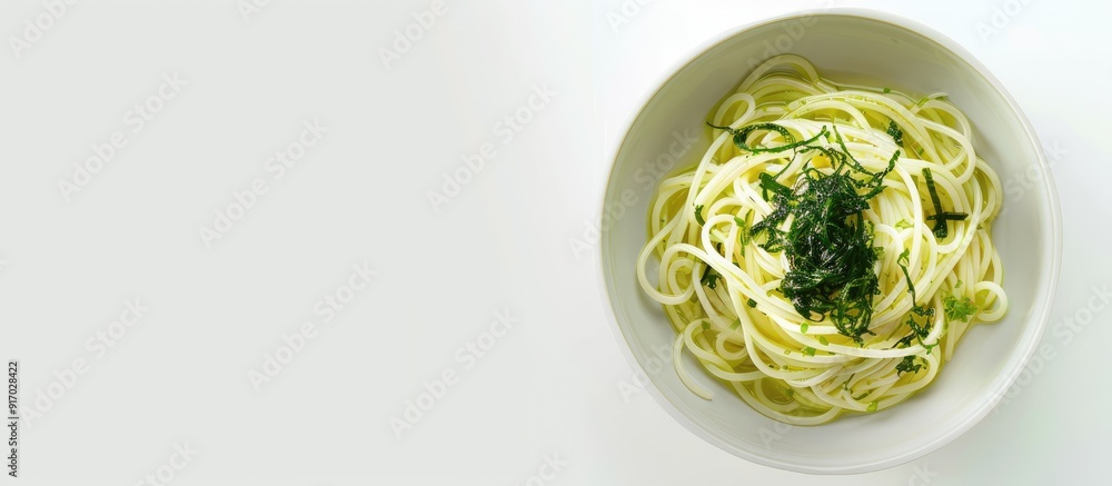 Poster a dish featuring pasta in a flavorful garlic sauce with seaweed presented nicely with a blank space 