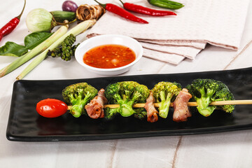 Thai Street foof satay with bacon and broccoli