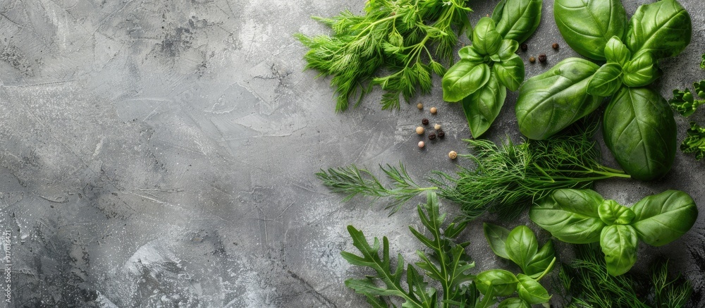 Aufkleber assorted fresh organic herbs like basil arugula and dill on a flat lay cooking concrete stone backgr