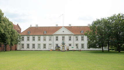 Odense Castle on a green lawn