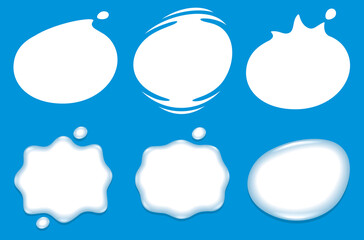 White (milk) splashes on blue background.