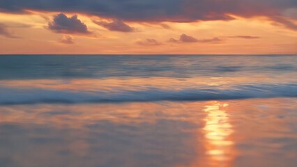 Fototapeta premium Serene Sunset Over Calm Ocean Waves