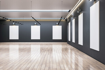 Contemporary gallery with empty frames on dark walls, wooden floor. 3D Rendering