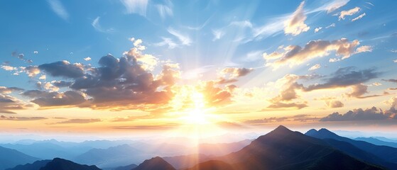 Breathtaking sunrise over misty mountain range, with vibrant colors and sunrays breaking through the clouds, creating a serene landscape view.