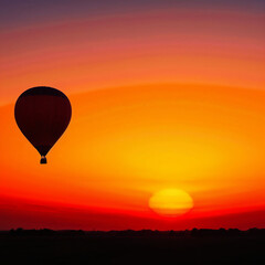 Fototapeta premium Hot Air Balloon Against a Dramatic Sunset